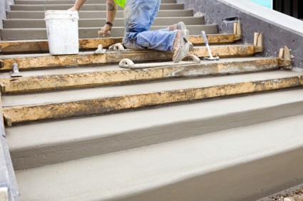 Basement Pro Foundations & Masonry mason building cement steps.